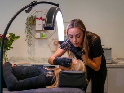 Beauty technician performing a treatment