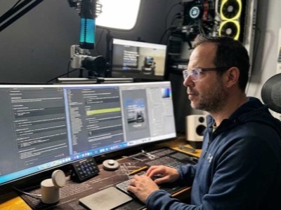 Owen Sutton building websites at his desk